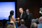 Vice President Brian Hamluk congratulates one of the graduating veterans. 