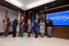 Members of the military stand for the Pledge of Allegiance during the 2022 Veterans Day ceremony. 