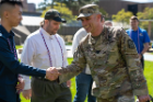 Veteran student graduates are congratulated and recognized by current serving members of the military.