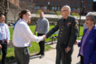 Efner "Lucky" Davis congratulates veteran graduate Shawn Patrick Greene.