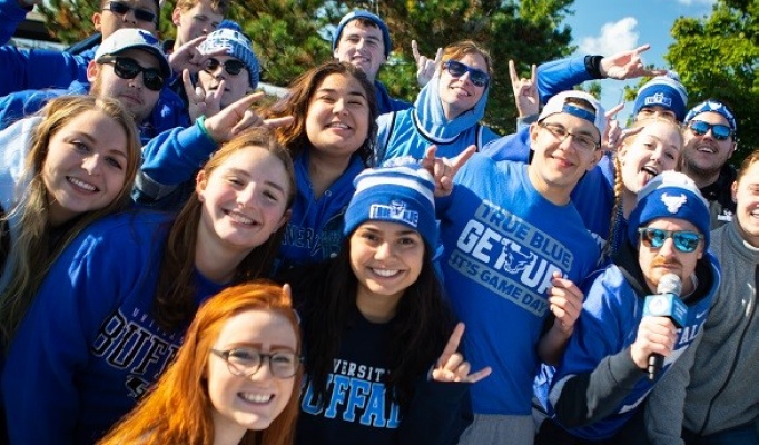 Student club members gathered outdoors. 